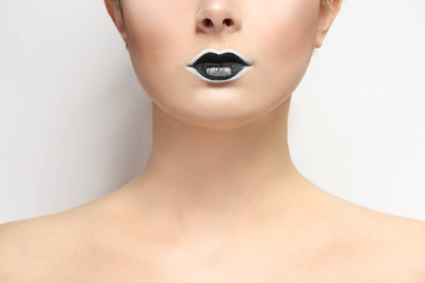 woman with creative lips makeup - Foto, afbeelding