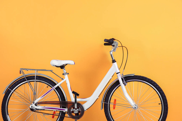 Bicycle on color background - Photo, Image