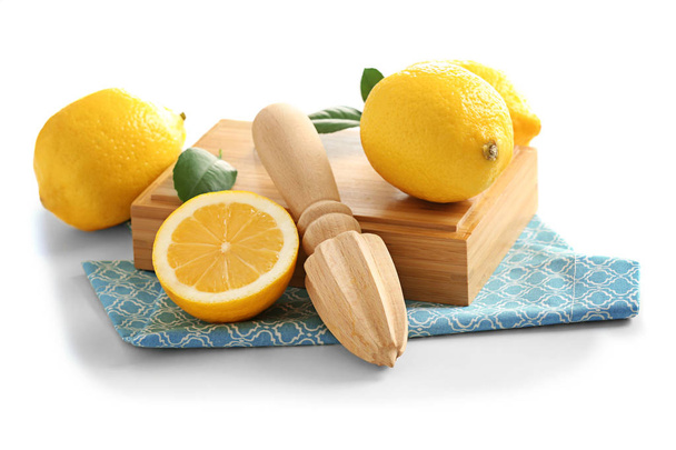 Wooden box with juicer and lemons - Zdjęcie, obraz