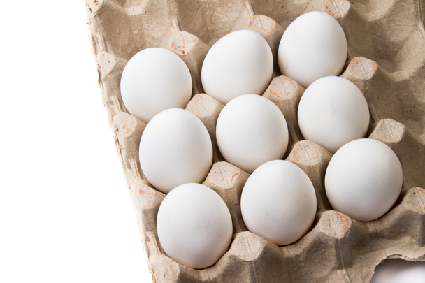 Huevos en el fondo blanco
 - Foto, imagen