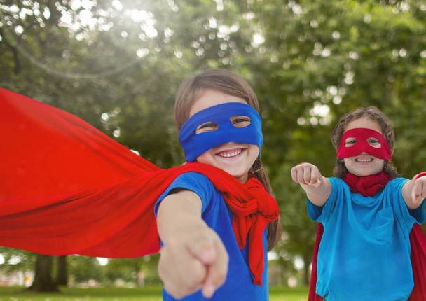 Superhero kids with trees background - Foto, immagini