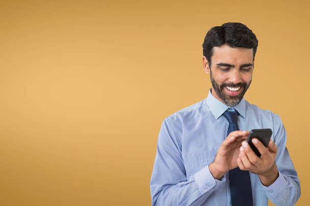 Happy businessman using the phone - Photo, image