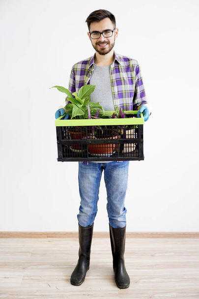 Male gardener with plants - Fotografie, Obrázek