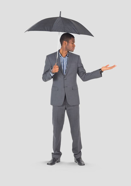 man holding umbrella  - Foto, Imagem