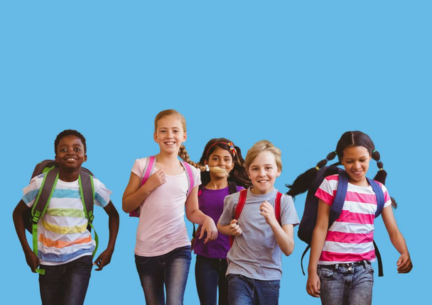 Running kids with blank blue background - Фото, зображення
