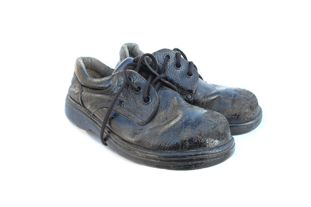 Παλιά παπούτσια ασφάλεια στις απομονωμένες - Φωτογραφία, εικόνα