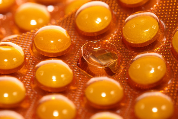 pozadí z makra žluté medicína tabletky - Fotografie, Obrázek