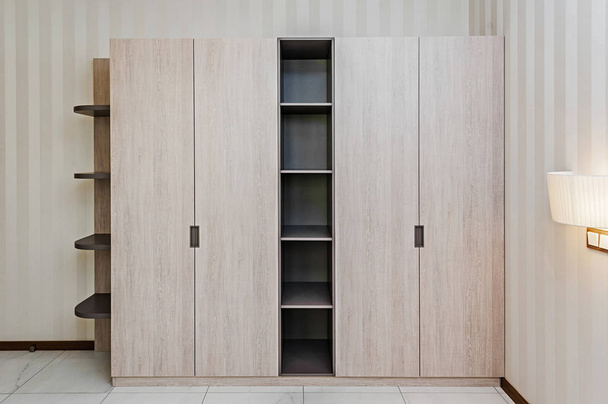 Modern wooden wardrobe in the room - Fotografie, Obrázek