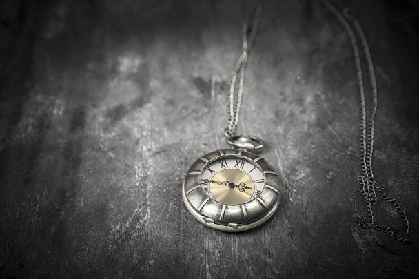 still life with vintage pocket watch on grunge wooden background - from above : vintage style - Photo, Image