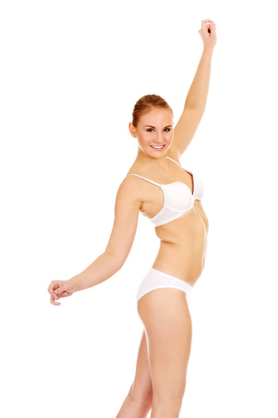 Beautiful slim woman in white underwear - Foto, Bild