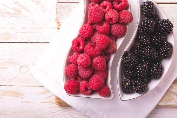 Raspberry, blackberry. Healthy food concept. Top view - Photo, Image
