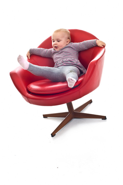 Babygirl on a chair - Foto, afbeelding