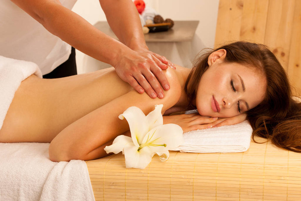 Body care. Spa body massage treatment. Woman having massage in t - Fotó, kép