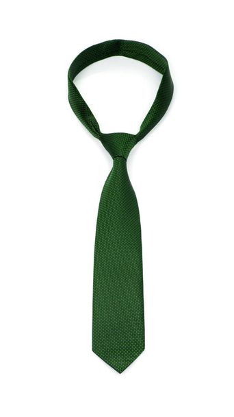 стильный связанный зеленый галстук на белом фоне
 - Фото, изображение