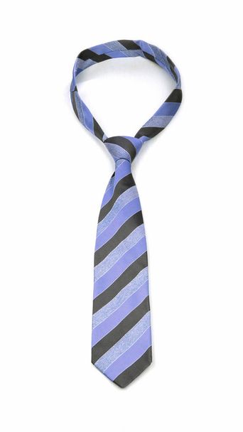 κομψό δεμένο μπλε και γκρίζο ριγέ γραβάτα απομονώνεται σε λευκό φόντο - Φωτογραφία, εικόνα