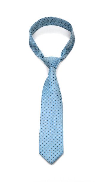 stijlvolle gebonden Azure Dotty stropdas geïsoleerd op witte achtergrond - Foto, afbeelding
