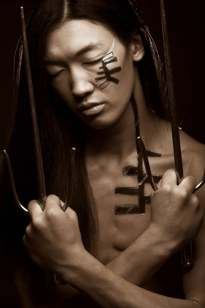 asian boy with weapons - Foto, imagen