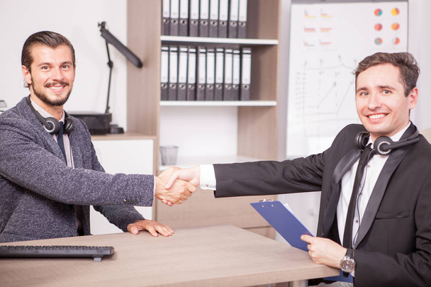 Business partners shaking hands in the office - Zdjęcie, obraz