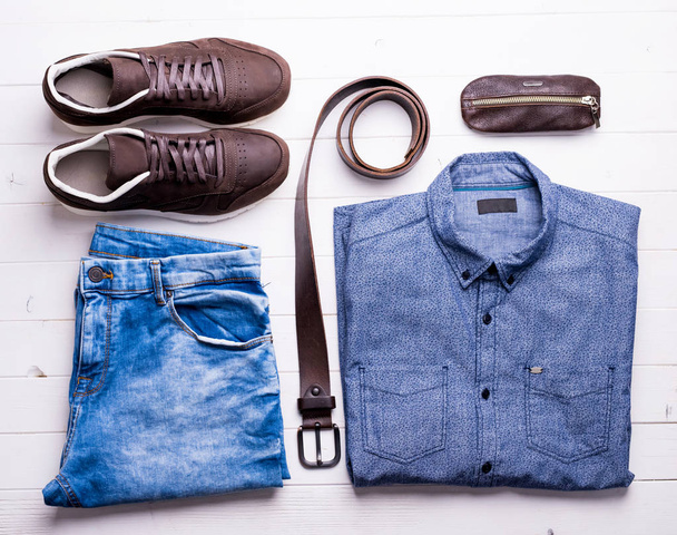 male jeans and shirt with brown belt and shoes - Foto, Imagem