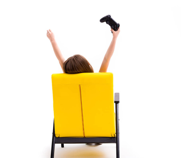 Konsol, sandalye, başa kamera kullanan kız - Fotoğraf, Görsel
