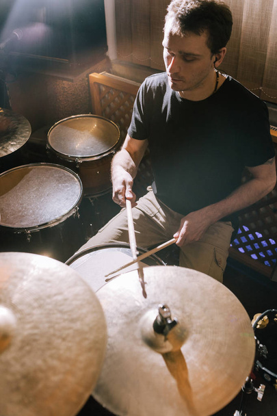 Drummer playing drums in recording studio - Foto, immagini