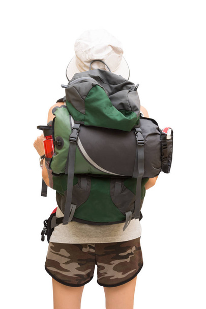 Full length portrait of female hiker looking at map  on white background - Photo, Image