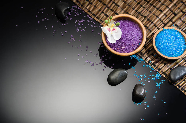 Spa concept on black background. Top view with copy space - 写真・画像