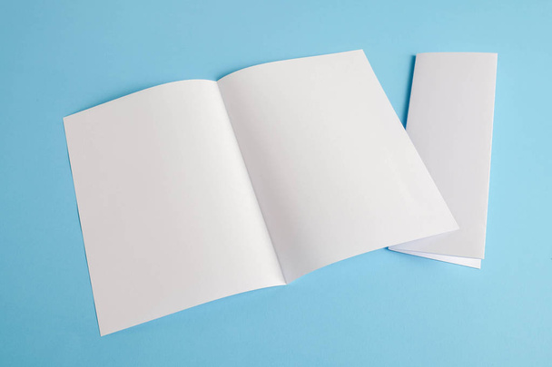 template fold white paper on blue background - Photo, image