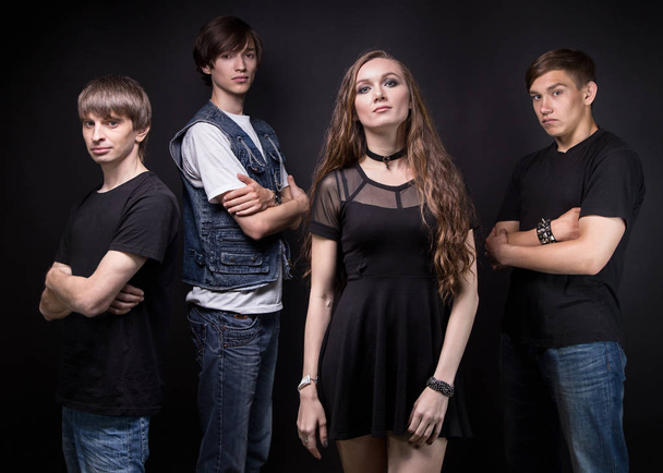 Photo of rock band - woman and three men - Zdjęcie, obraz