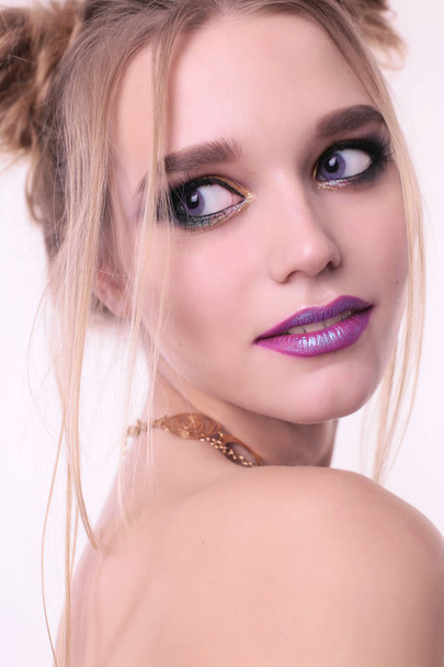beautiful young girl with blond hair and bright makeup - Photo, Image