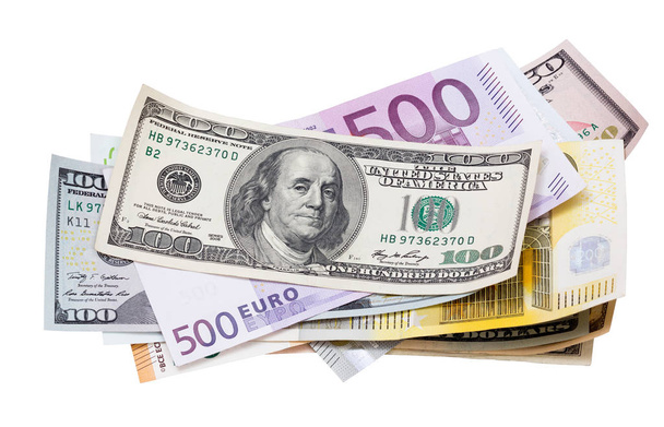 Закрытие банкнот евро и доллара на белом фоне
. - Фото, изображение