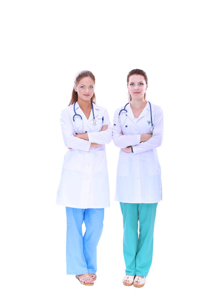 Two young woman doctor , standing in hospital - Foto, afbeelding