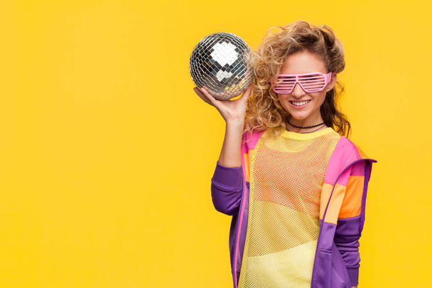 Trendy hipster with disco ball - Фото, зображення