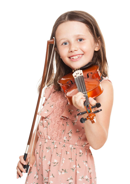 Young  brunette girl playing violin. - Zdjęcie, obraz