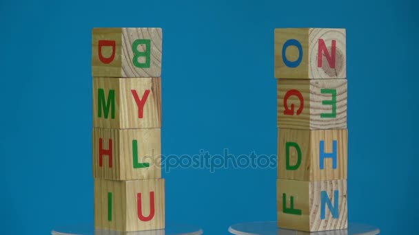 Rotating  two alphabetic cube stacks for child - Video, Çekim