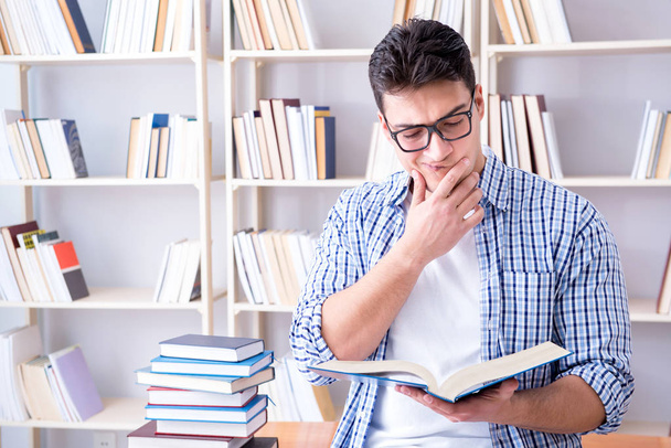 Young student with books preparing for exams - Foto, Imagen