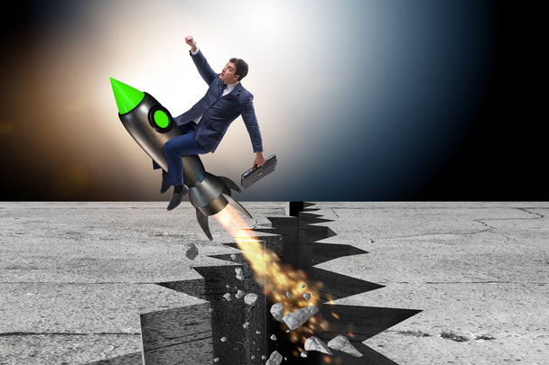 Бізнесмен летить на ракеті з розриву каменю
 - Фото, зображення