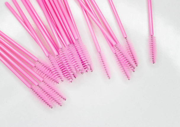 Brushes for eyelashes on white - Photo, Image