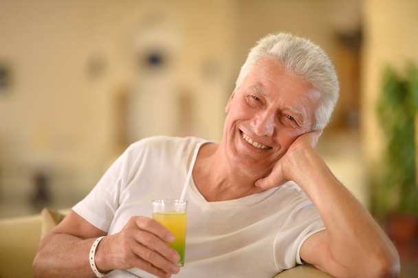 senior man with cocktail  - Fotografie, Obrázek