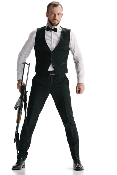 secret agent in suit with rifle - 写真・画像