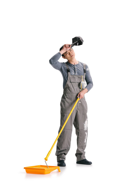 construction worker with roller brush - Foto, Imagen