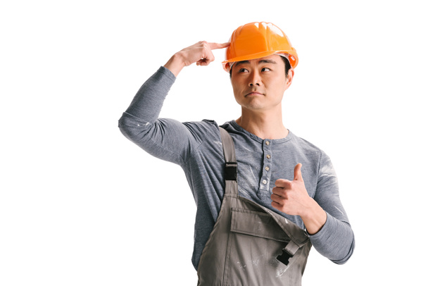 stavební dělník ponting na helmu - Fotografie, Obrázek
