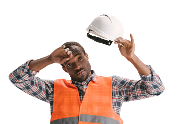 Trabalhador da construção no capacete
 - Foto, Imagem