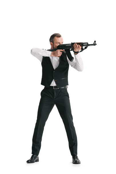 agente secreto en traje con rifle
 - Foto, Imagen