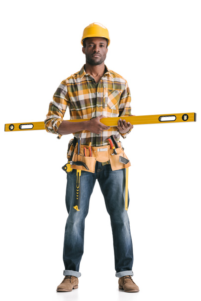 construction worker with leveling tool - Valokuva, kuva