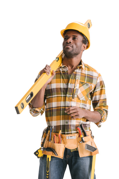 construction worker with leveling tool - Φωτογραφία, εικόνα