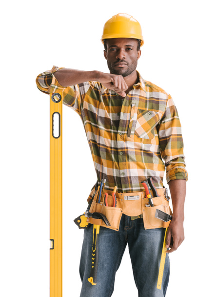 construction worker with leveling tool - 写真・画像