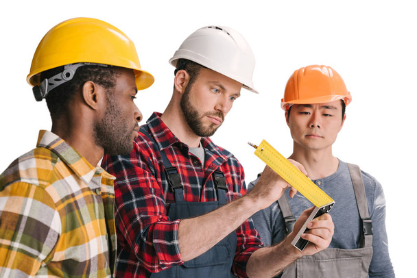 grupo de trabajadores multiétnicos de la construcción
 - Foto, Imagen