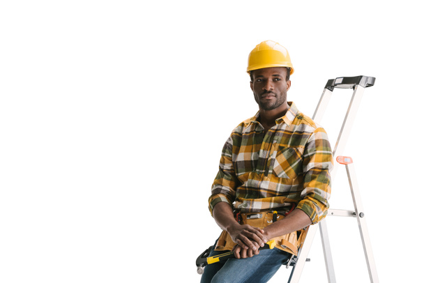 thoughtful builder sitting on ladder - Photo, Image