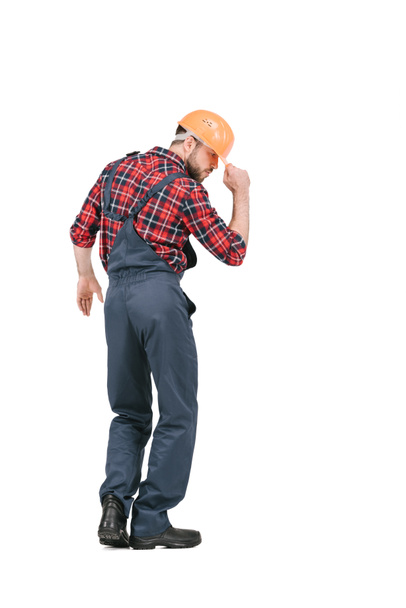 construction worker dancing in overall and hardhat - Valokuva, kuva